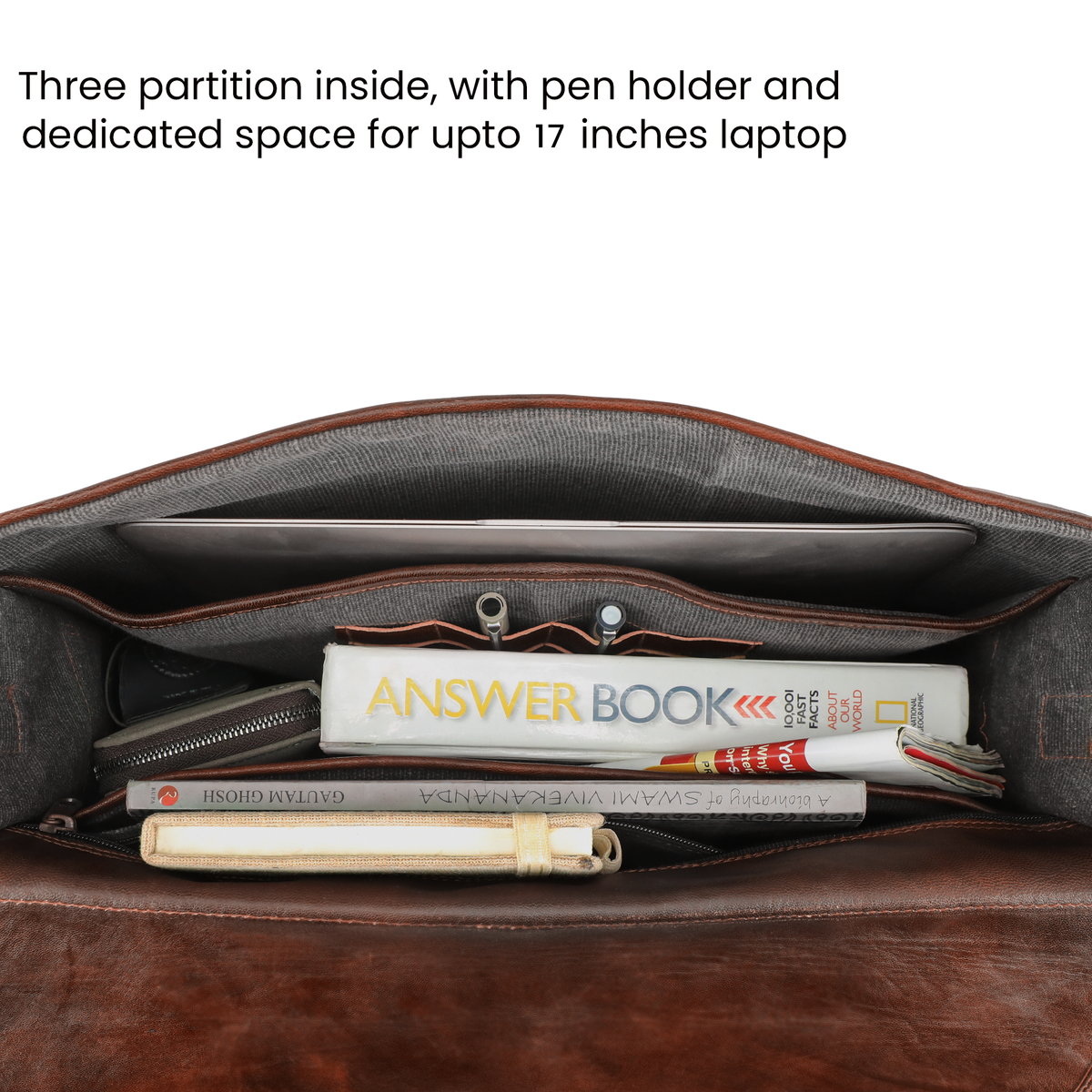 Interior of the leather bag having canvas lining and  2 partition, 1 dedicated padded laptop sleeve and 1 spacious compartment, has pen holders, and big inner zipper pocket