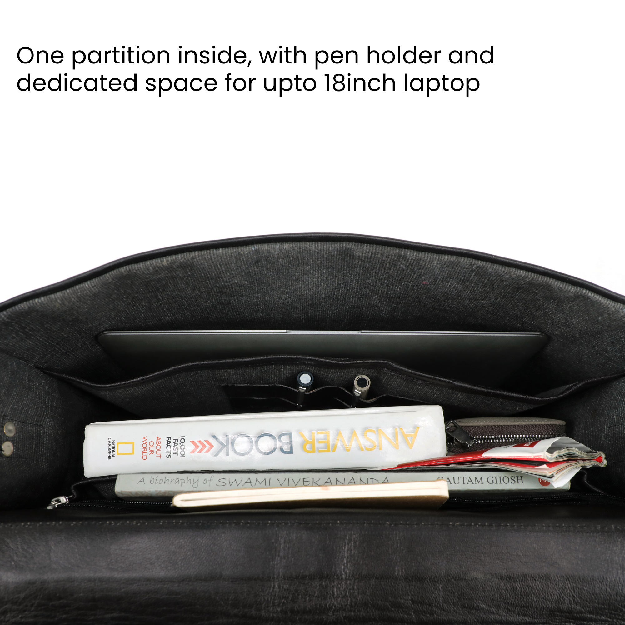 Inside of the black leather bag for men showing dedicated laptop compartment, pen slots, and spacious compartment for books or documents