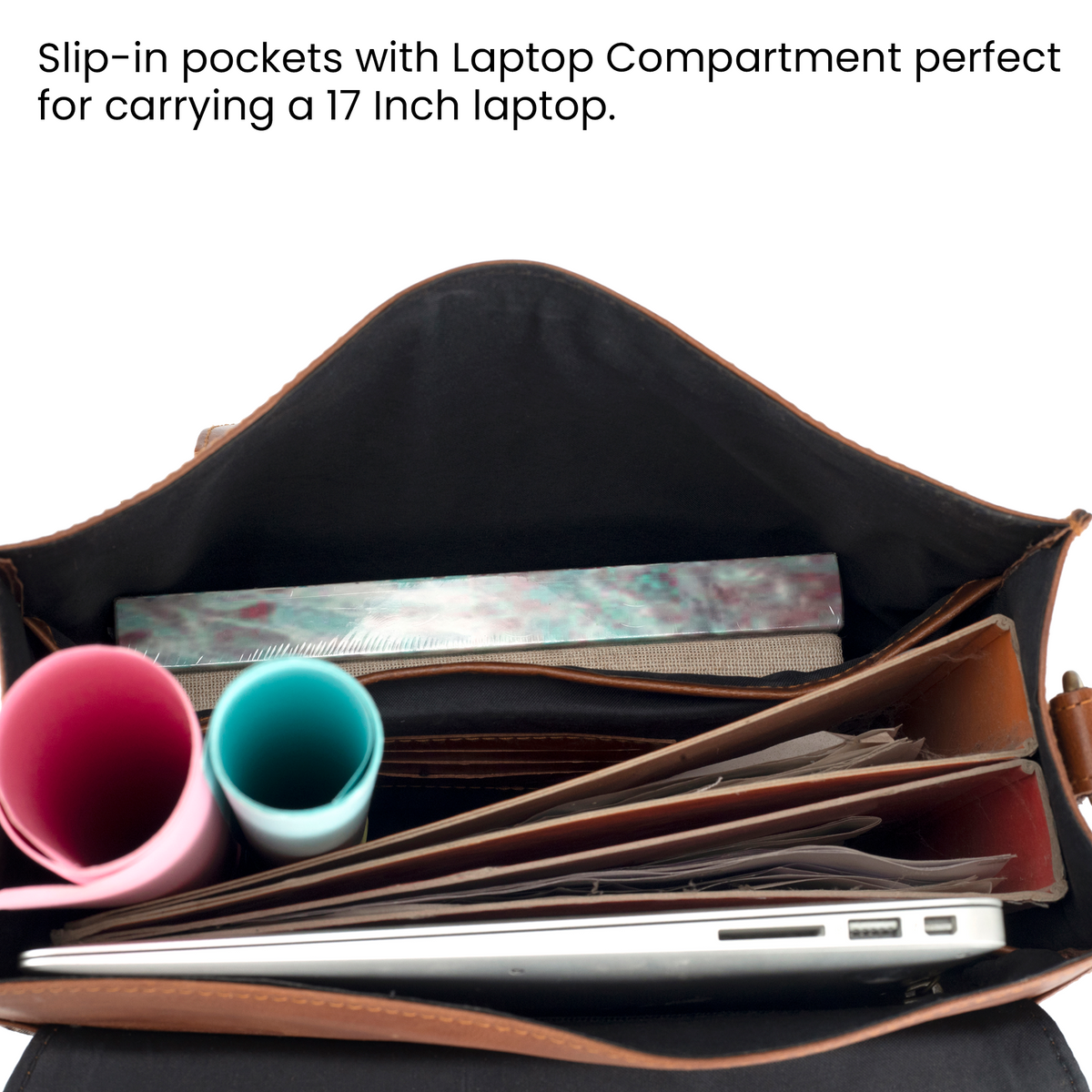 inside of the leather backpack showing the different compartment zippered pockets card holder 