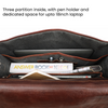 Inside of the black leather bag for men showing dedicated laptop compartment, pen slots, and spacious compartment for books or documents