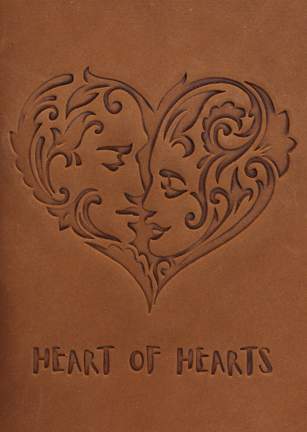 Hand Embossing on a Leather Journal with two people making a heart shape design and heart of heart written below it