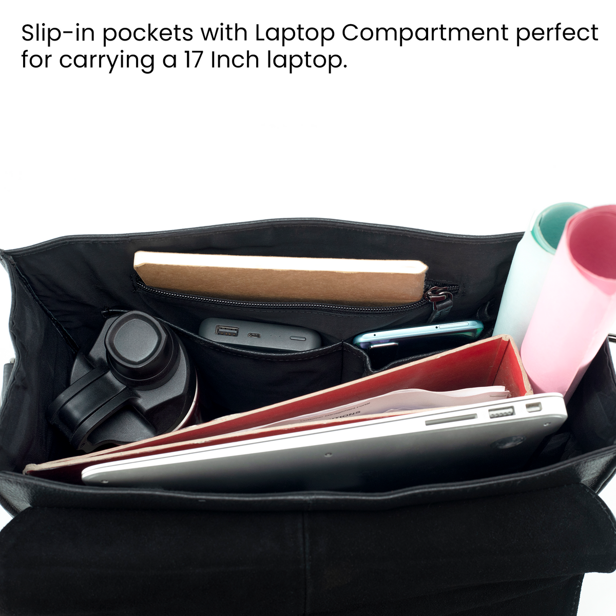 inside of the leather backpack showing the different compartment zippered pockets card holder