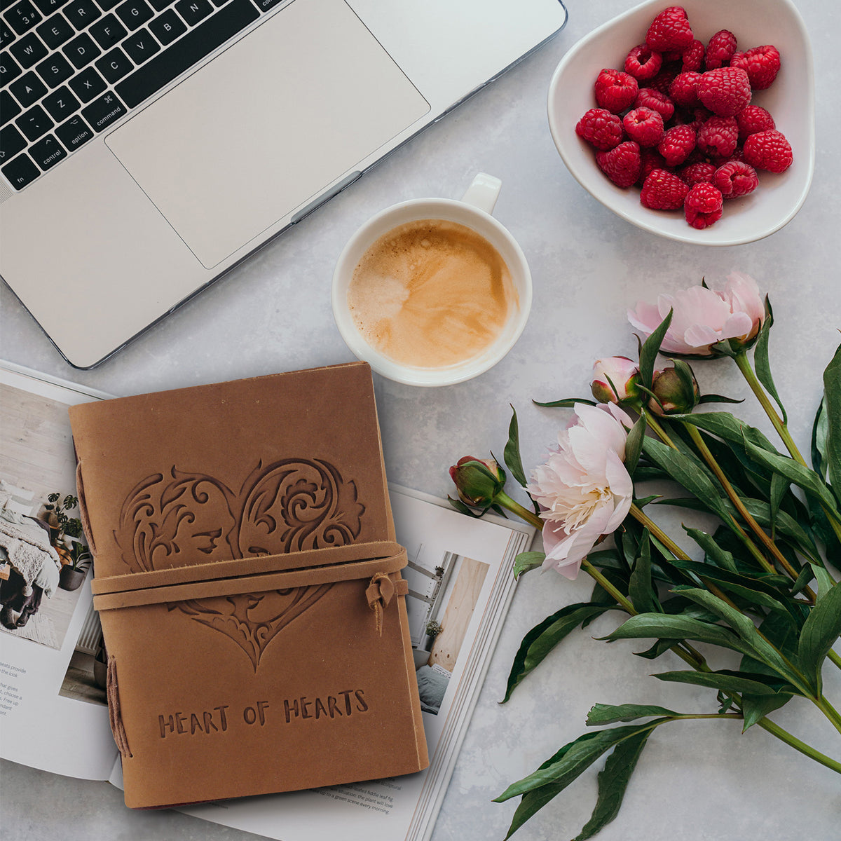Leather Textnote By Handmade World Lying on table with laptop, flowers, coffee and berries in a bowl.