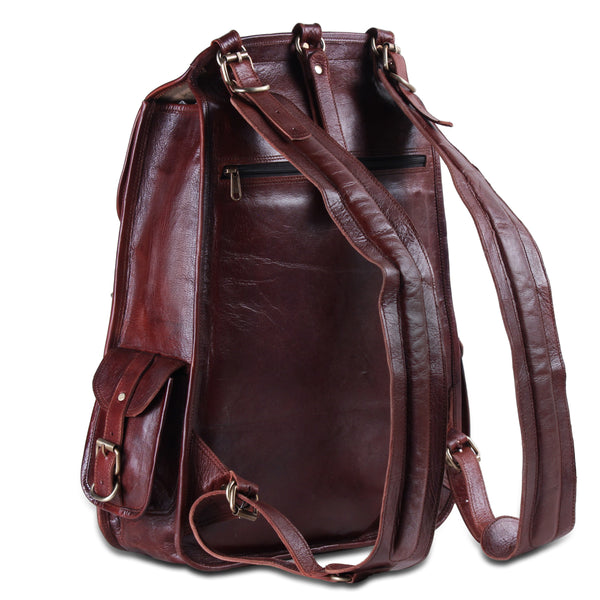 Back side view of the leather backpack showing adjustable shoulder strap and back zipper pocket