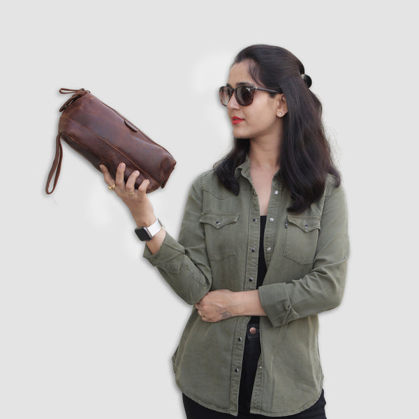 Model with Brown Leather Toiletry Bag