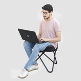 Model Sitting on Genuine Leather Black Foot Stool